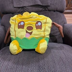 Disney’s Munchlings Peanut Butter Chocolate Swirl Pluto Plush Backpack NWT